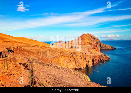 View of the bay in Ponta de Sao Lourenco, the island of Madeira, Portugal. There are rocky cliffs and clear water of the Atlantic Ocean with white Stock Photo