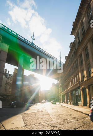 Newcastle UK - 12th May 2019: Newcastle famous Tyne Bridge on a sunny day with blue skies and fluffy clouds Stock Photo