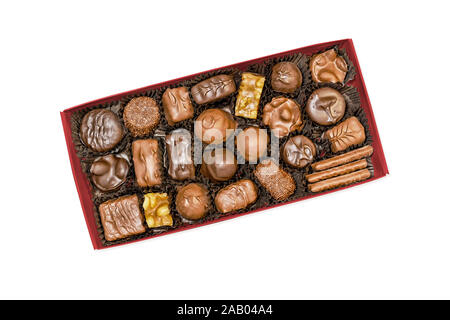 Box of assorted chocolate candies, view from above, isolated on white background with clipping path Stock Photo