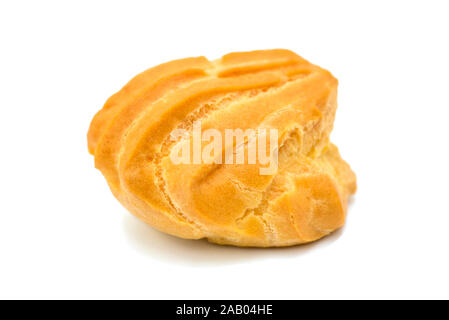 Profiteroles, close-up. Puffs cakes filled with pastry cream. Confectionery, eclair on a white background. Stock Photo