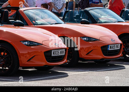 Line of Orange Mazda Miata MX-5 ND Mark 4 30th Anniversary model Stock Photo