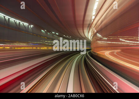 Red an purple abstract high speed curved movement toward to the future , just around the corner, concept. Stock Photo