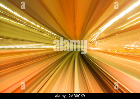 Yellow abstract high speed curved movement toward to the future , just around the corner concept. Stock Photo