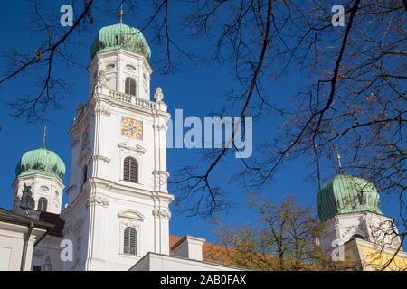 St. Stephen's Cathedral is an baroque white church with green metal domes on top of the towers in Passau, Germany Stock Photo