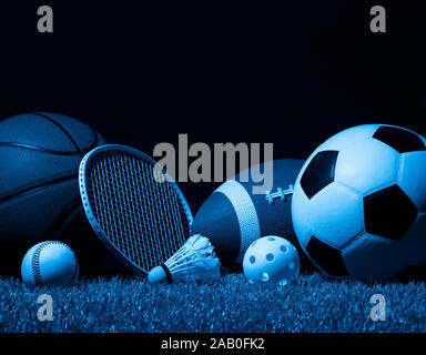 Sport Balls And Badminton Rackets On Football Grass Top View Copy Space Stock Photo Alamy