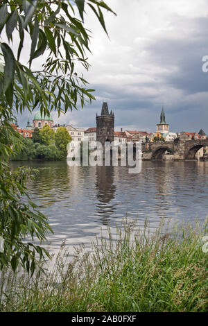 The famous Charles Bridge The Old Town Bridge Tower started in 1357 under the auspices of King Charles IV, and finished in the beginning of the 15th c Stock Photo