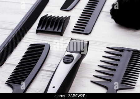 Professional hairdresser tools on table close up. Stock Photo
