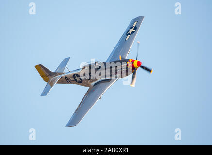 MONROE, NC (USA) - November 9, 2019: A P-51 Mustang fighter plane in flight at the Warbirds Over Monroe Air Show. Stock Photo