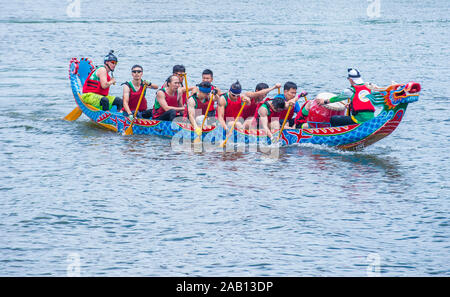 Dragonboat team racing during the 2019 Taipei Dragon Boat festival in Taipei Taiwan Stock Photo