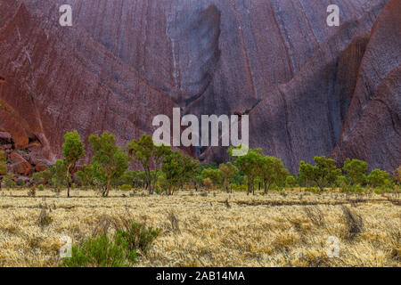 Uluru (Ayres Rock) in the rain after a long drought. Uluru, Northern Territory, Australia Stock Photo