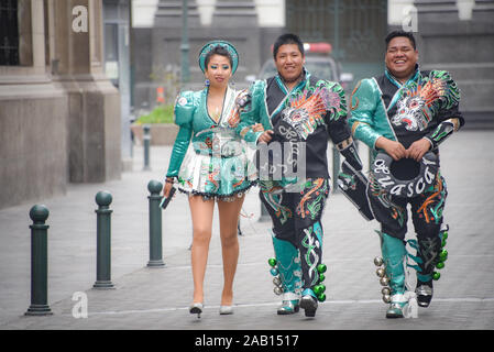 Lima, Peru - Nov 17, 2019: A group of young dancers in traditional costumes attend an event in Lima's Plaza de Armas Stock Photo