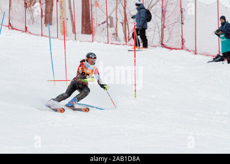 Quebec,Canada. a skier competes in the Super Serie Sports Experts Ladies slalom race held at Val Saint-Come Stock Photo