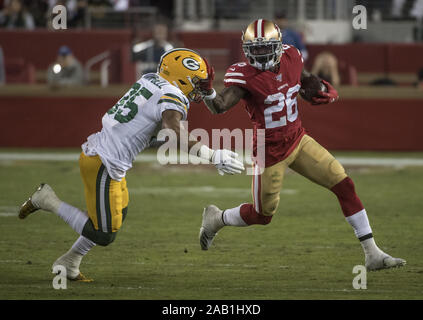 Green Bay Packers defensive back Charles Woodson looks at the crowd after  intercepting a pass during the second quarter against the Oakland Raiders  at Lambeau Field on December 11, 2011 in Green