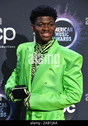 Los Angeles, United States. 24th Nov, 2019. Rapper Lil Nas X appears backstage with his award for Favorite Song - Rap/Hip-Hop for 'Old Town Road' ft. Billy Ray Cyrus, during the 47th annual American Music Awards at the Microsoft Theater in Los Angeles on Sunday, November 24, 2019. Photo by Jim Ruymen/UPI Credit: UPI/Alamy Live News Stock Photo