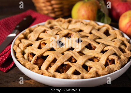 Apple Pie With Whole Wheat Lattice Crust In Baking Dish. Closeup View. Traditional American Fall Bake Stock Photo