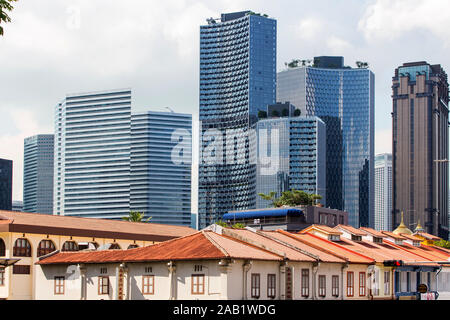 Singapore has evolved rapidly over the past decades, retaining the refurnished shophouses and the expansion of modern skyscrapers, architectures Stock Photo