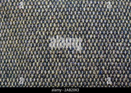 Fabric texture of coarse burlap gray. Knitting Stock Photo