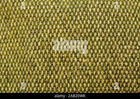 The texture of the fabric is from the coarse burlap yellow. Knitting Stock Photo