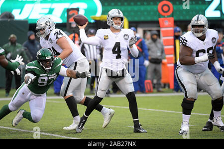 East Rutherford, New Jersey, USA. 24th Nov, 2019. Oakland Raiders  quarterback Derek Carr (4) during a NFL game between the Oakland Raiders  and the New York Jets at MetLife Stadium in East