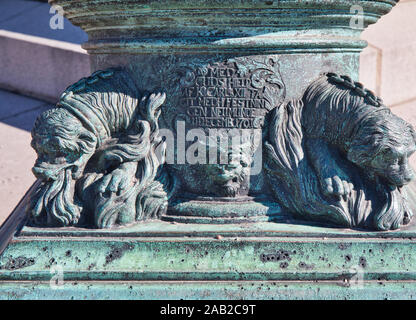Bronze mortars around the plinth of the bronze statue of King Karl XII by Johan Peter Molin, Kungstradgarden, Stockholm, Sweden Stock Photo
