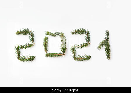 Number of new year 2021 made of fir branches. Flat lay, top view Stock Photo