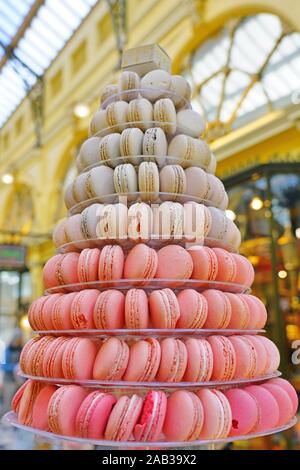 View of a tower of colorful macaron cookies in a pastry shop Stock Photo