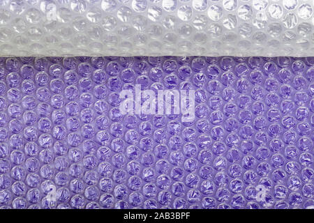 Packaging bubble wrap on color background Stock Photo