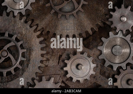 Rusty gears and cogs background Stock Photo