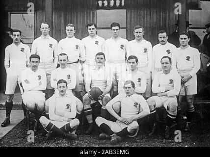 Vintage photograph of the The England Rugby Union Team in 1909 for their game against Ireland. The players were: John Jackett (Leicester), Edgar Mobbs (Northampton), Cyril Wright (Cambridge University), Ronnie Poulton-Palmer (Oxford University), AC Palmer (London H.), F Hutchinson (Headingley) HJH Sibree (Harlequins), HJS Morton (Cambridge University), Robert Dibble (Bridgwater & Albion) capt., WA Johns (Gloucester), AL Kewney (Leicester), AJ Wilson (Camborne School of Mines), FG Handford (Manchester), H Archer (Guy's Hospital), ET Ibbitson (Headingley). England won the game 11-5. Stock Photo