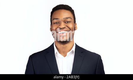 Young smiling black guy over white background Stock Photo
