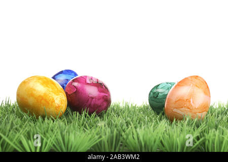 Farbige Ostereier auf Rasen |Colored Easter eggs on grass| Stock Photo