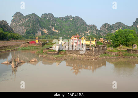 Typical colorful Vietnamese tomb, Ninh Binh in Vietnam Stock Photo