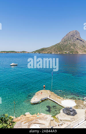 Views over Masouri towards the island of Telendos, Kalymnos, Dodecanese, Greece Stock Photo