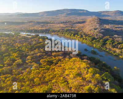 A sunrise over the Mazowe river seen from a drone. Stock Photo