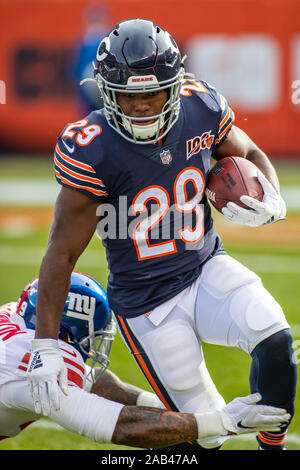 Chicago, Illinois, USA. 24th Nov, 2019. - Bears #29 Tarik Cohen is chased by Giants #29 Deone Bucannon during the NFL Game between the New York Giants and Chicago Bears at Soldier Field in Chicago, IL. Photographer: Mike Wulf. Credit: csm/Alamy Live News Stock Photo