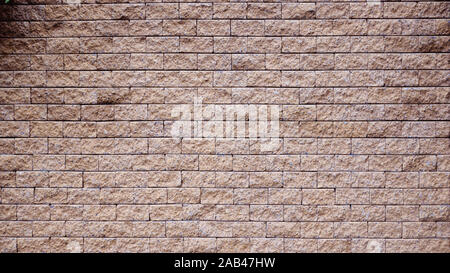 Brown rock stone Seamless texture, background, stone lined  walls. sandstone. stone background wall. Facing Stone .Architecture design . for photoshop Stock Photo