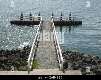 Jetty at the Ijsselmeer on the Afsluitdijk A7, the Netherlands. Stock Photo