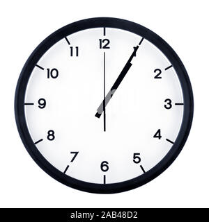 Classic analog clock pointing at one O five, isolated on white background. Stock Photo