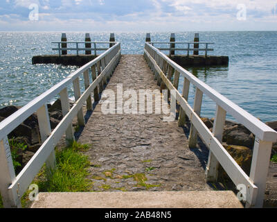 Jetty at the Ijsselmeer on the Afsluitdijk A7, the Netherlands. Stock Photo