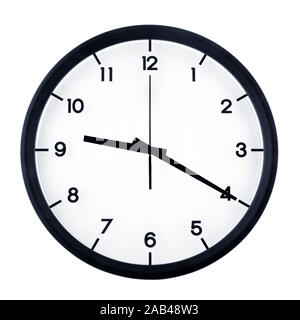 Classic analog clock pointing at nine twenty, isolated on white background. Stock Photo