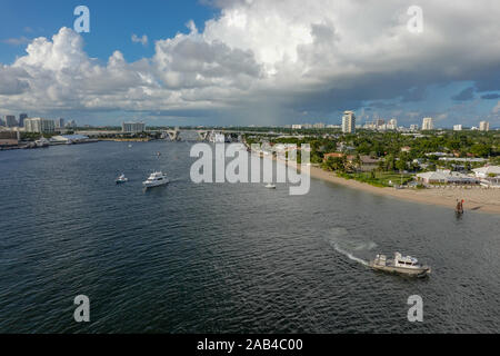 Ft. Lauderdale, FL/USA-10/31/19: The view from a cruise ship of Port Everglades, in Ft. Lauderdale, Florida of the channel out to the ocean with a lux Stock Photo