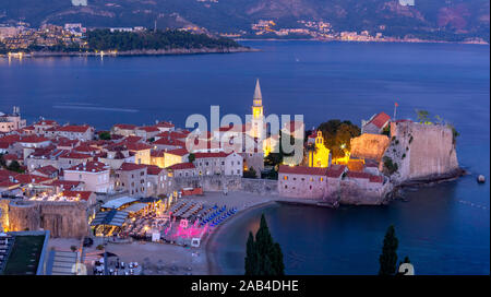 Panoramic night view of The Old Town of Montenegrin town Budva on the Adriatic Sea, Montenegro Stock Photo