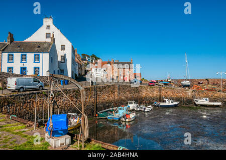 Boats in the harbour of the picturesque seaside village of Crail in the East Neuk of Fife, Scotland. Stock Photo