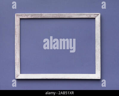Empty frame with wooden border on gray background Stock Photo