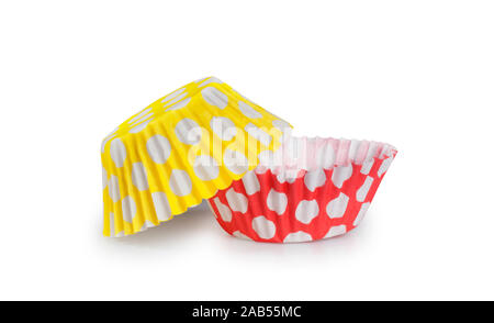 Studio shot of cupcake holders isolated on a white background - John Gollop Stock Photo