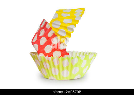 Studio shot of cupcake holders isolated on a white background - John Gollop Stock Photo