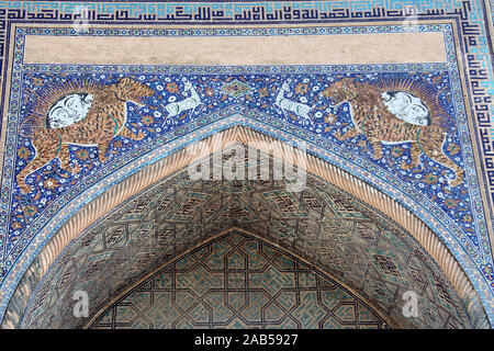 Tiger mosaic detail on Sher-Dor Madrasah in Samarkand Stock Photo