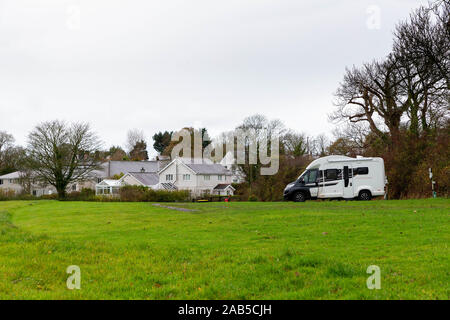 Solitary Swift Motorhome sits in a large field on Anglesey near the village of Llysfor Stock Photo