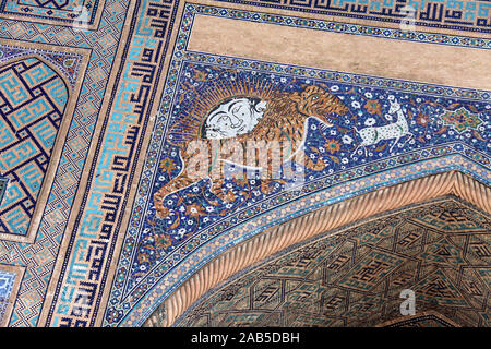Tiger mosaic detail on Sher-Dor Madrasah in Samarkand Stock Photo