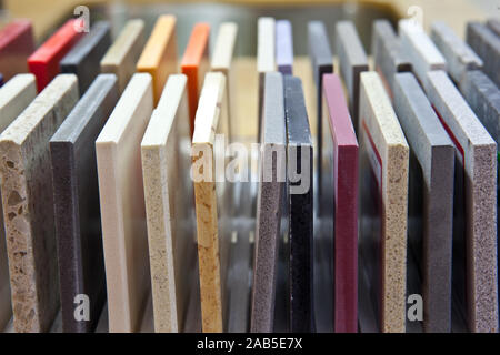 Granite table top with square kitchen countertop slabs made of stone Stock Photo